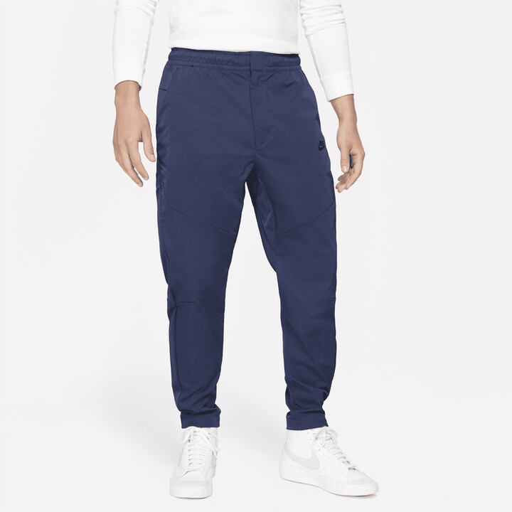 Nike Men's Sportswear Tech Essentials Unlined Commuter Pants in Blue