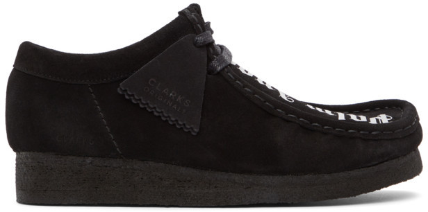 all black wallabees