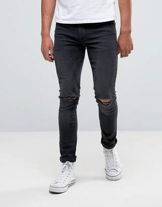 ASOS Design Super Skinny Jeans With Knee Rips In Dark Grey Wash