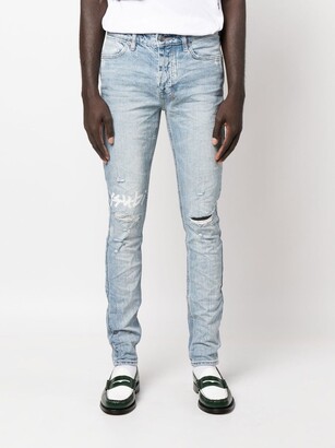 Ksubi Logo-Print Distressed Skinny-Cut Jeans