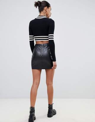PrettyLittleThing Faux Leather Wrap Mini Skirt