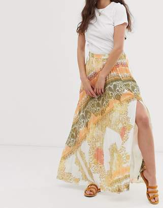 ASOS Design DESIGN pleated maxi skirt in bright orange scarf print