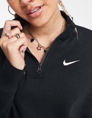 Nike mini Swoosh oversized 1/4-zip sweatshirt in black