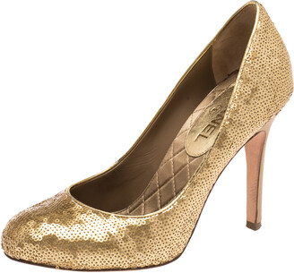 gold round toe pumps
