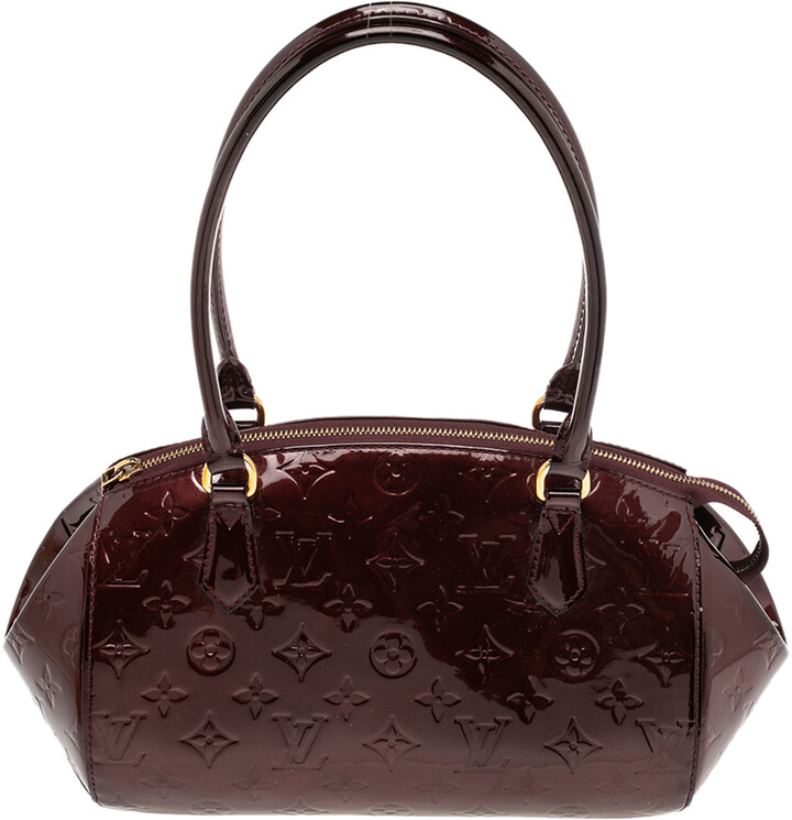 louis vuitton cream handbolsa