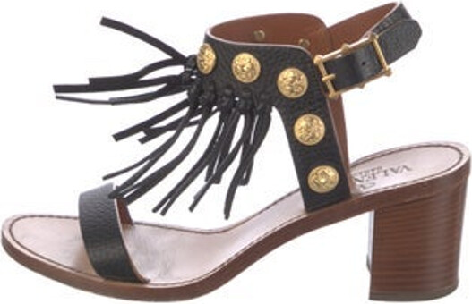 Valentino Leather Slingback Sandals Black Animal Print Fringe & Studded Accents Buckle Closure at Ankles Unfortunately, due to restrictions, this item may not be eligible for shipping in all areas.
