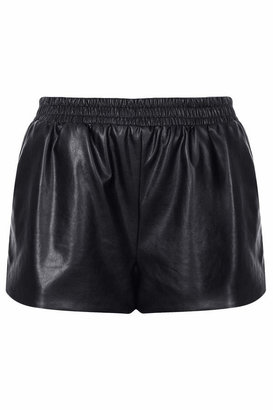 Topshop Black faux leather runner shorts with elasticated waistband. 82% viscose,18% polyurethane. machine washable.