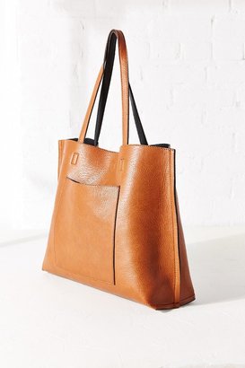 Urban Outfitters Reversible Vegan Leather Tote Bag - ShopStyle Women