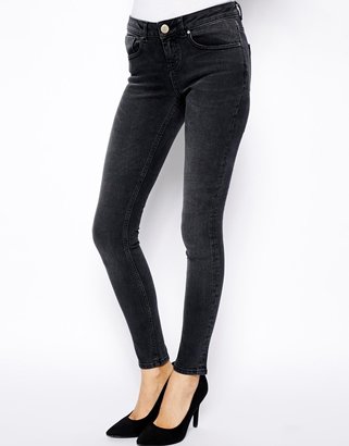 ASOS COLLECTION Whitby Low Rise Skinny Jeans in Washed Black