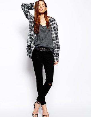 ASOS Whitby Low Rise Skinny Ankle Grazer Jeans in Clean Black with Ripped Knee