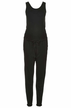 Topshop Maternity soft jersey sleeveless jumpsuit with elasticated waistband to fit below the bump in black. 50% cotton, 50% polyester. machine washable.