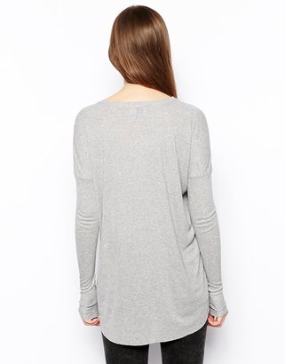 ASOS TALL Long Sleeve Top With Curved Hem In Rib