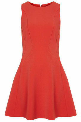 Topshop Woven flippy dress with seam detailing and zip fastening to the back. toughen it up with a pair of leather ankle boots