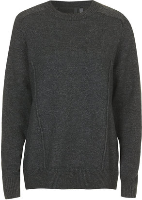 Topshop Boutique. 51% lambswool, 33% acrylic, 16% nylon. do not tumble dry. Premium lambswool blend slouchy jumper with raglan set-in sleeves.