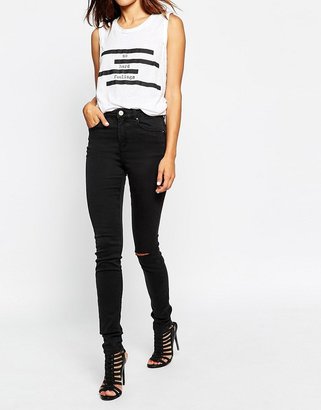 ASOS Ridley Skinny Jeans In Washed Black With Ripped Knee