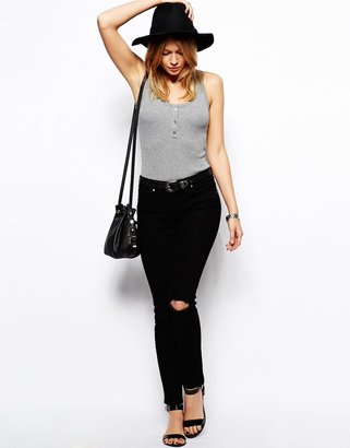 ASOS Whitby Low Rise Skinny Jeans in Clean Black with Ripped Knee