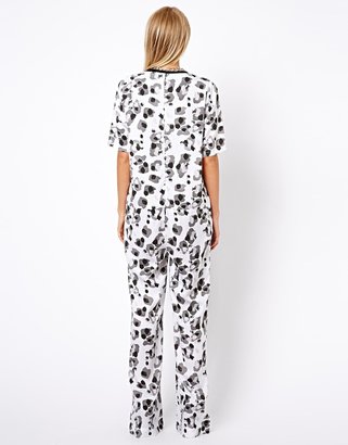 ASOS Wide Leg Jumpsuit in white leopard print