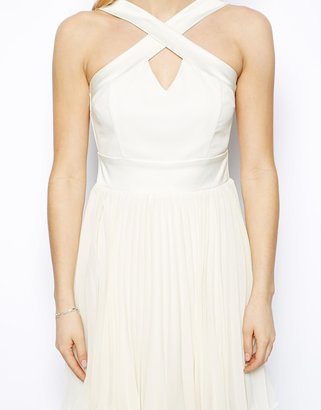 Lydia Bright Skater Dress With Crossover Neck And Pleated Skirt