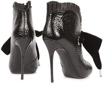 Alexander McQueen Black patent leather ankle boots