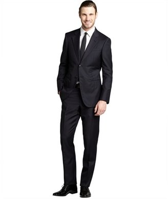 Giorgio Armani black pinstripe wool two-button suit with flat front pants