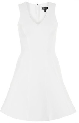 Topshop Fit and flare style skater dress with seam detail, raw edges and zip fastening to the back. length - 86cm. 100% polyester. machine washable.