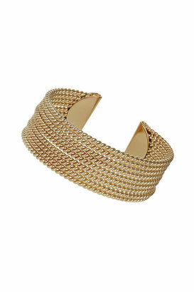 Topshop Freedom at 100% metal. Gold look cuff made of several twisted metal rows, width 6.5cm.