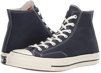 black suede converse high tops