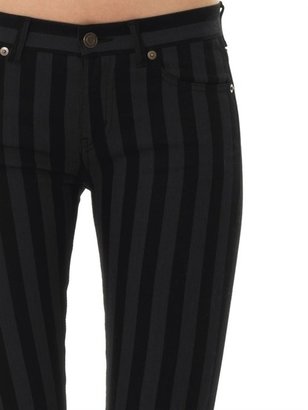 Saint Laurent Striped mid-rise skinny jeans