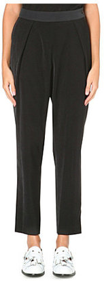 Issey Miyake Pleated tapered trousers