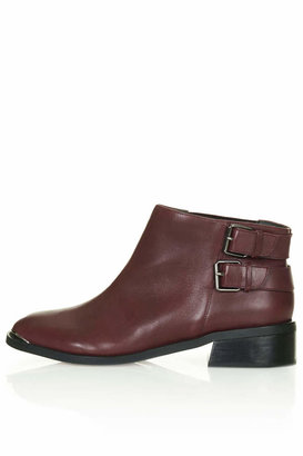 Topshop Bordeaux leather zip side boots with buckle detail. 100% leather.