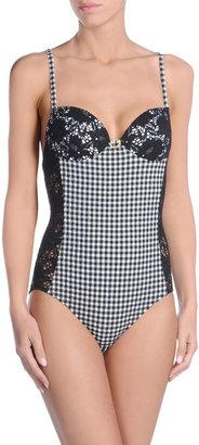 Moschino One-piece suits