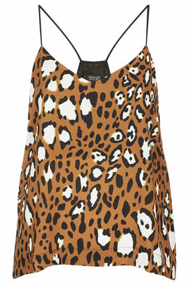 Topshop Strappy cami in all-over animal spot print with contrast black straps. 100% polyester. machine washable.