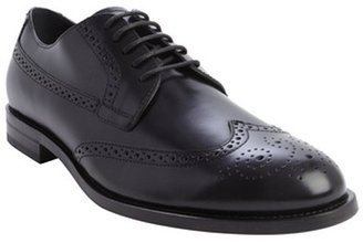 Tod's black leather wingtip accent lace up oxfords