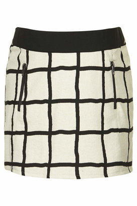 Topshop Maternity pelmet skirt in window pane woven check with zip front detailing and jersey waist panel to fit comfortably under the bump, designed to fit throughout all stages of pregnancy. 58% cotton, 28% polyester, 14% viscose. machine washable.