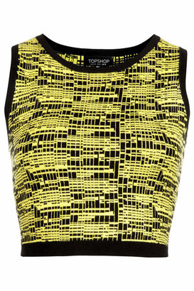 Topshop Crew neck sleeveless crop top in graphic yellow and black print. 79% viscose, 18% nylon, 3% elastane. machine washable.