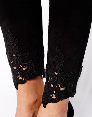 ASOS Whitby Low Rise Skinny Jeans in Black with Crochet Hem