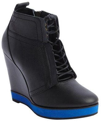 Nanette Lepore black and navy leather lace up wedge heel booties