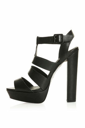 Topshop Black leather gladiator sandals. heel height approximately 5". 100% leather. specialist leather clean only.