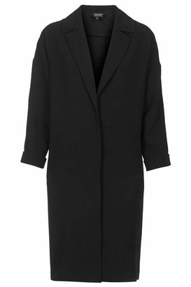 Topshop Petite oversized longer length throw on lightweight coat with front popper fastenings. 100% polyester. machine washable.