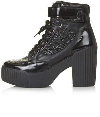 Topshop Chunky lace up trainers. heel height approximately 4". 100% polyurethane.