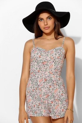 UO 2289 Pins And Needles Smocked Open-Back Floral Romper
