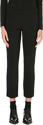 The Row Slim-fit tapered cotton-blend trousers Black