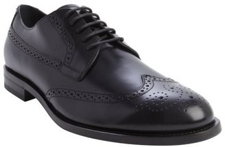 Tod's black leather wingtip accent lace up oxfords