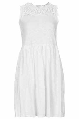 Topshop Jersey smock dress with lace neckline and sheer lace back. fastens with zip to the back. style it with flat sandals