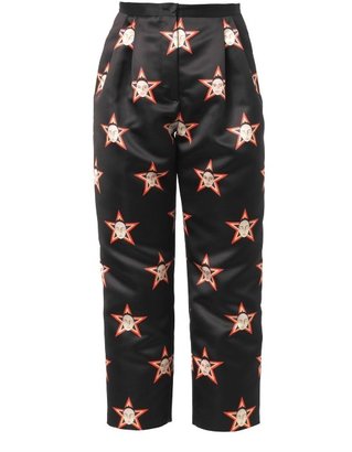 CATERINA GATTA Faces and stars-print satin trousers