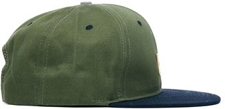 ASOS Snap Back Cap with Contrast Peak and Badge