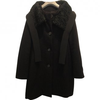 Moncler First "Ochre" model coat