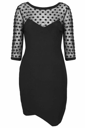 Topshop Scuba bodycon dress with sequin polka dot mesh contrast panel to the neck and sleeves. with zip fastening to the back and asymmetric hem. length - 84cm. 93% polyester, 7% elastane. machine washable.