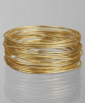 RJ Graziano set of 24 - gold plated thin bangles