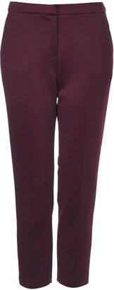 Topshop Tailored cigarette trousers in oxblood scuba finish. 88% polyester, 12% elastane. wash seperately.